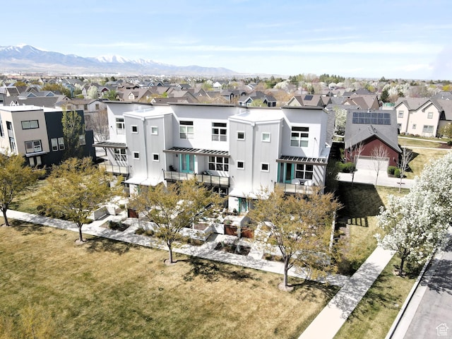 bird's eye view featuring a mountain view and a residential view