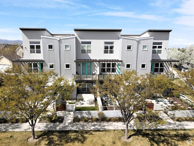 rear view of property with metal roof
