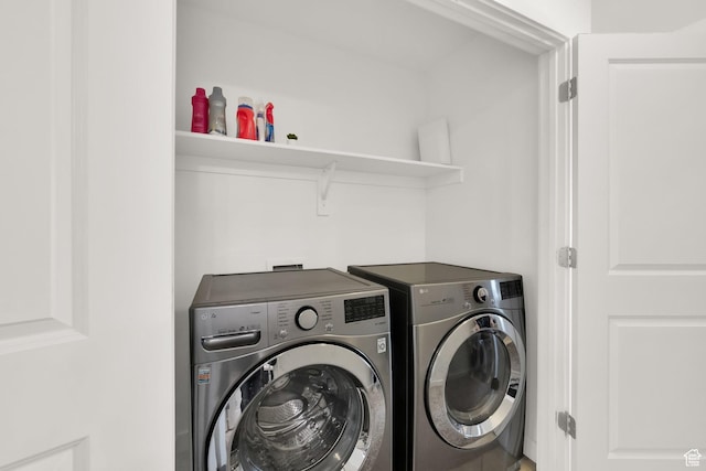 laundry area with washer and dryer and laundry area