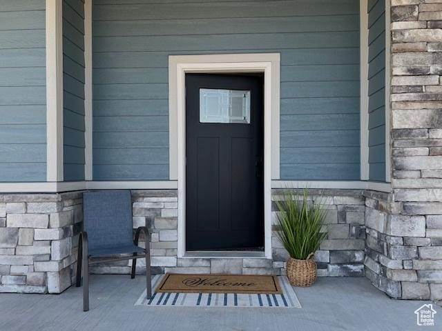 650 Blue Sage Dr, Fish Haven, ID 83287 - view of exterior entry featuring stone siding