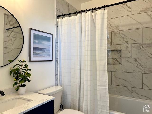 650 Blue Sage Dr, Fish Haven, ID 83287 - full bath with toilet, shower / bath combo with shower curtain, and vanity