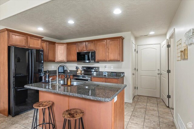 576 E 1540 S, Lehi, UT 84043 - kitchen featuring brown cabinets, a breakfast bar, a sink, and stainless steel appliances