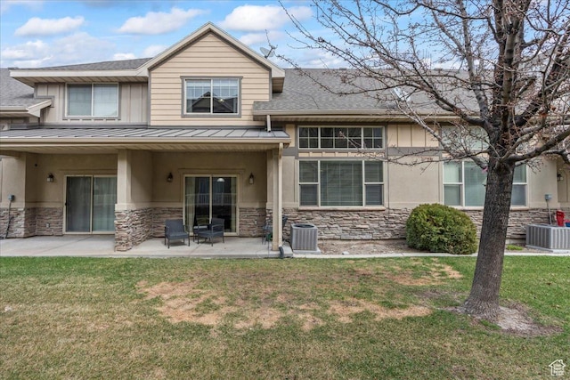 576 E 1540 S, Lehi, UT 84043 - exterior space featuring stone siding, a lawn, central AC unit, and a patio