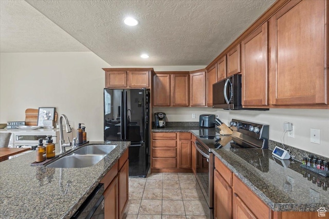 576 E 1540 S, Lehi, UT 84043 - kitchen featuring a sink, brown cabinetry, black appliances, and dark stone countertops
