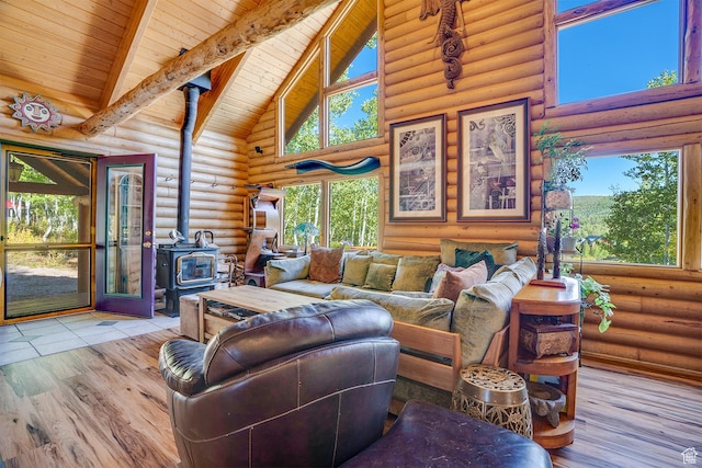 4547 Fawn Way Unit 2050, Heber City, UT 84032 - living area with a wood stove, high vaulted ceiling, wood ceiling, beam ceiling, and wood finished floors