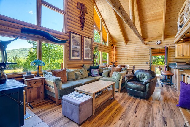 4547 Fawn Way Unit 2050, Heber City, UT 84032 - living area featuring high vaulted ceiling, light wood-style floors, wood ceiling, and beam ceiling