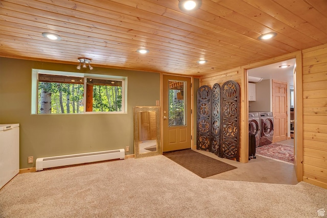 4547 Fawn Way Unit 2050, Heber City, UT 84032 - foyer entrance featuring washing machine and clothes dryer, carpet floors, wooden ceiling, and a baseboard heating unit