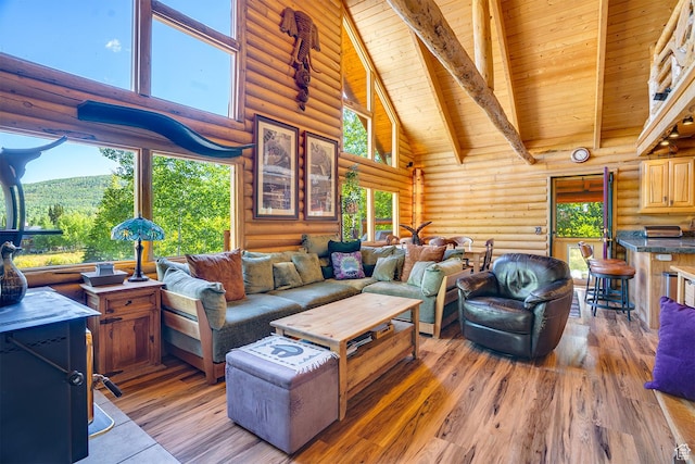 4547 Fawn Way Unit 2050, Heber City, UT 84032 - living room featuring high vaulted ceiling, light wood-style floors, wooden ceiling, and beam ceiling