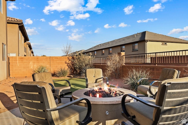 3837 W Lazy River Cir Unit 111, Santa Clara, UT 84765 - view of patio with a fire pit and a fenced backyard