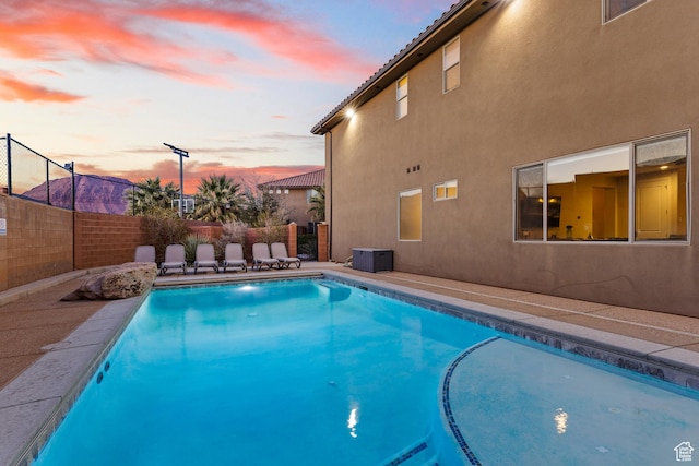 3837 W Lazy River Cir Unit 111, Santa Clara, UT 84765 - view of swimming pool with a fenced in pool, fence, and a patio