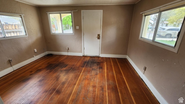 488 S 100 W, Price, UT 84501 - spare room featuring hardwood / wood-style flooring, plenty of natural light, and baseboards
