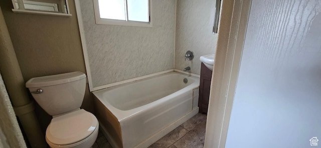 488 S 100 W, Price, UT 84501 - bathroom with toilet, a tub, and tile patterned floors