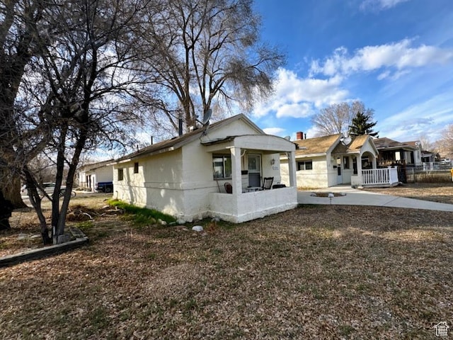 488 S 100 W, Price, UT 84501 - view of front of home featuring a porch and fence
