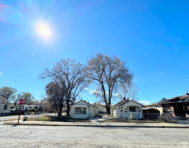 488 S 100 W, Price, UT 84501 - bungalow-style house with a fenced front yard and a residential view