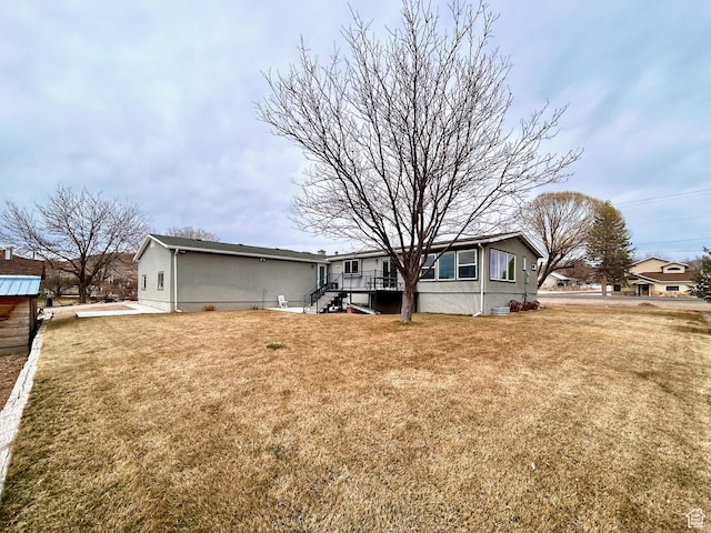 view of front of home with a front lawn