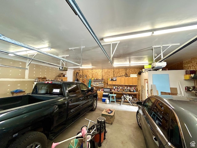 garage featuring a garage door opener