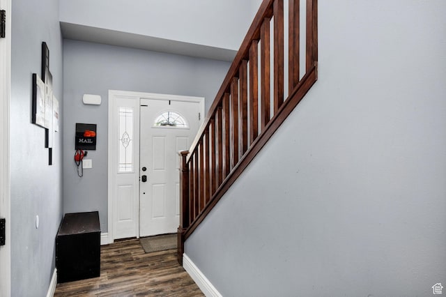 687 N 130 E, Smithfield, UT 84335 - entrance foyer featuring baseboards, dark wood-style flooring, and stairway