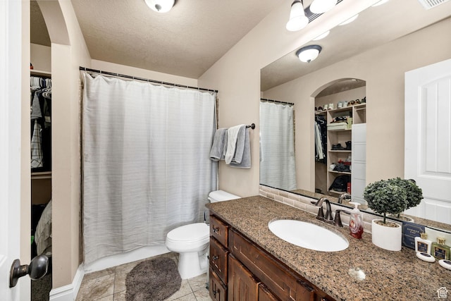 687 N 130 E, Smithfield, UT 84335 - full bathroom featuring a shower with shower curtain, toilet, a spacious closet, and vanity