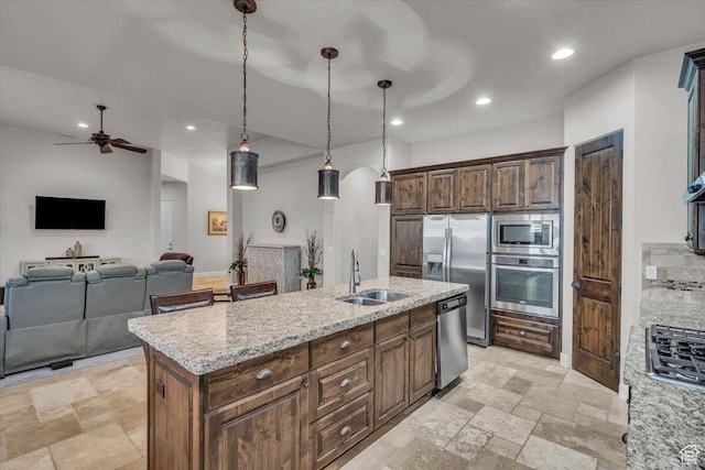 3308 S Red Sands Way, Hurricane, UT 84737 - kitchen with a sink, appliances with stainless steel finishes, stone tile flooring, ceiling fan, and recessed lighting