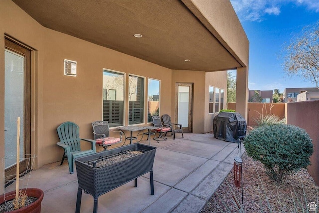 3308 S Red Sands Way, Hurricane, UT 84737 - view of patio with a grill, fence, and a fire pit