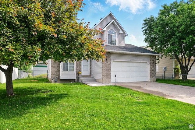 495 W 1330 N, Logan, UT 84341 - view of front of house with concrete driveway, brick siding, entry steps, and an attached garage
