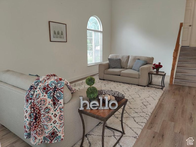 495 W 1330 N, Logan, UT 84341 - living room featuring wood finished floors, stairs, and baseboards