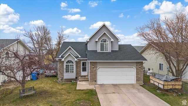 view of front of home featuring brick siding, concrete driveway, a garage, and a front lawn