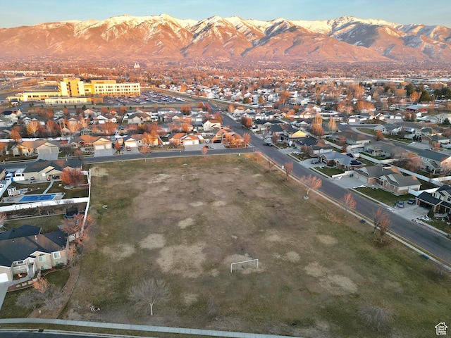 681 S Vance Dr W, Layton, UT 84041 - aerial overview of property's location featuring a mountainous background and nearby suburban area