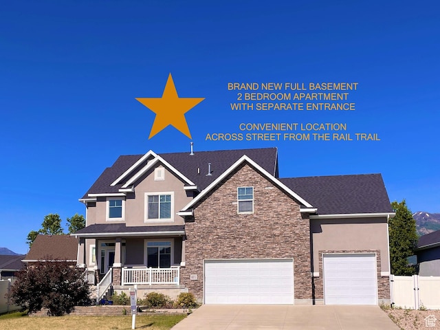 681 S Vance Dr W, Layton, UT 84041 - view of front of home featuring stone siding, a porch, stucco siding, driveway, and an attached garage