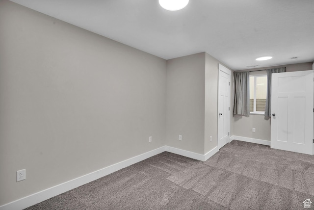681 S Vance Dr W, Layton, UT 84041 - spare room with baseboards and dark carpet
