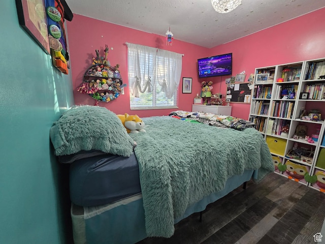 8894 S Sun Leaf Dr, West Jordan, UT 84088 - bedroom with wood finished floors and a textured ceiling