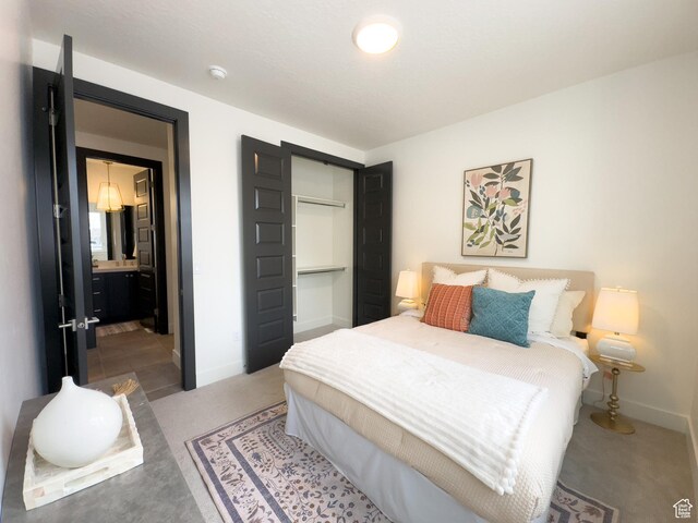 1718 W Trey Way Unit 2, West Jordan, UT 84084 - carpeted bedroom with a closet and baseboards