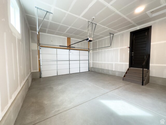 1718 W Trey Way Unit 2, West Jordan, UT 84084 - garage with a garage door opener