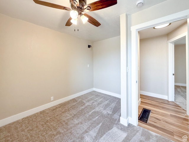 510 W Highway Dr, Wellington, UT 84542 - carpeted empty room featuring baseboards, ceiling fan, and visible vents