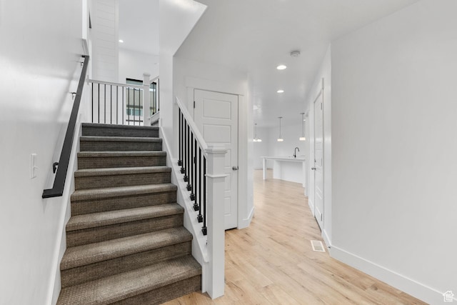 951 W Cushing Rd, Bluffdale, UT 84065 - stairs featuring baseboards, visible vents, wood finished floors, and recessed lighting