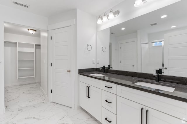 951 W Cushing Rd, Bluffdale, UT 84065 - bathroom featuring marble finish floor, visible vents, and a sink