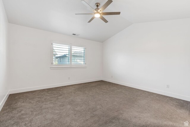 951 W Cushing Rd, Bluffdale, UT 84065 - spare room featuring vaulted ceiling, a ceiling fan, dark colored carpet, baseboards, and visible vents