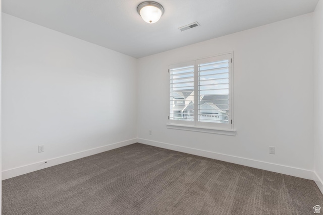 951 W Cushing Rd, Bluffdale, UT 84065 - unfurnished room featuring baseboards, visible vents, and dark colored carpet