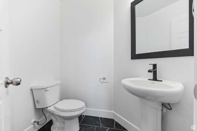 951 W Cushing Rd, Bluffdale, UT 84065 - half bathroom featuring baseboards, marble finish floor, and toilet