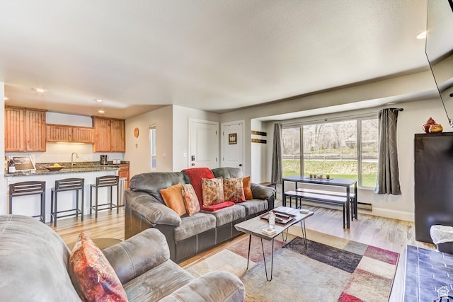 1637 Village Round Dr Unit 8, Park City, UT 84098 - living room with baseboards, recessed lighting, and light wood-style floors
