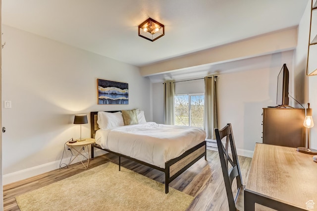 1637 Village Round Dr Unit 8, Park City, UT 84098 - bedroom with light wood-style flooring and baseboards