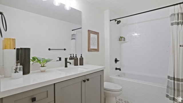 bathroom featuring toilet, vanity, and shower / bath combo