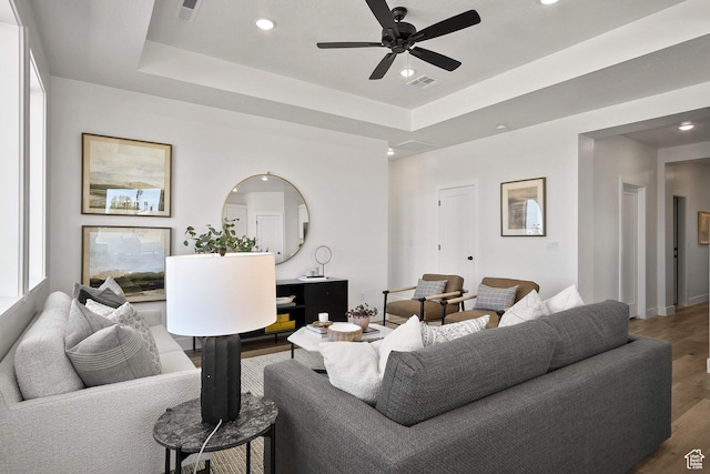 330 W Rosie Loop Unit 45E, Cedar City, UT 84720 - living area with wood finished floors, recessed lighting, a ceiling fan, a tray ceiling, and baseboards