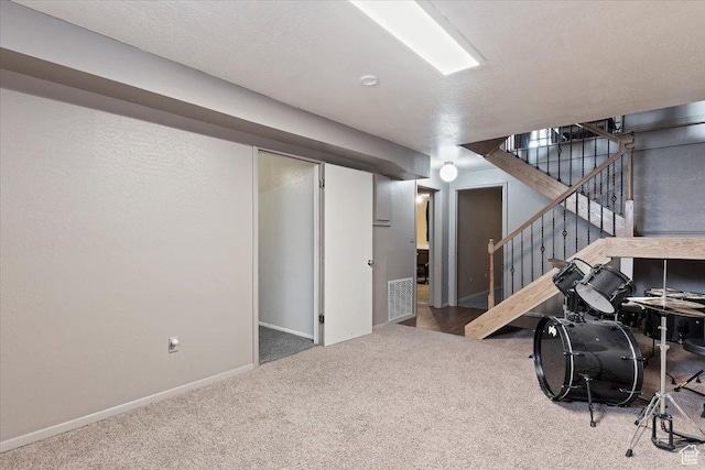 613 N 100 E, Brigham City, UT 84302 - finished basement with carpet, baseboards, stairs, and visible vents