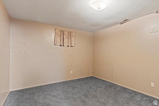 613 N 100 E, Brigham City, UT 84302 - empty room featuring baseboards, a textured ceiling, visible vents, and carpet