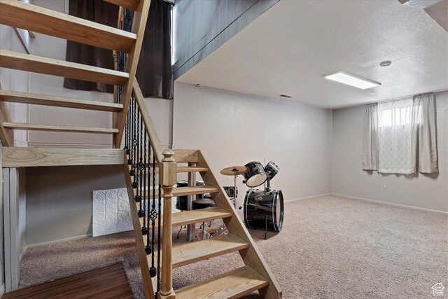 613 N 100 E, Brigham City, UT 84302 - staircase with carpet floors, a textured ceiling, baseboards, and visible vents