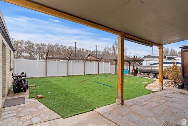 613 N 100 E, Brigham City, UT 84302 - view of yard with a fenced backyard and a patio area