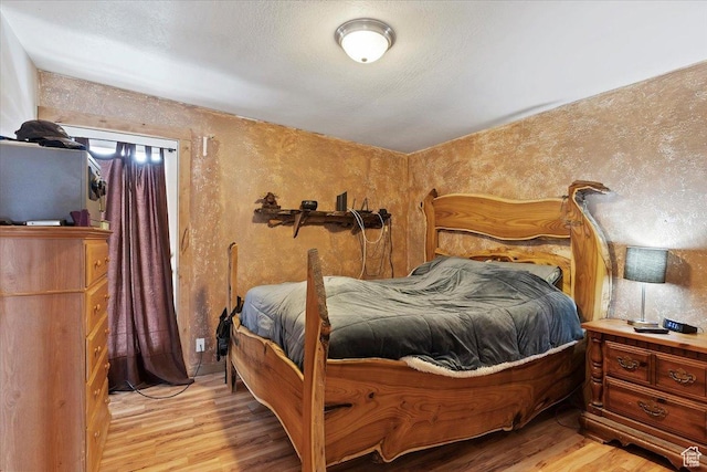 613 N 100 E, Brigham City, UT 84302 - bedroom featuring light wood-style flooring