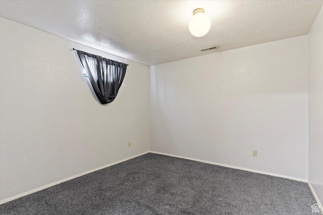 613 N 100 E, Brigham City, UT 84302 - carpeted empty room featuring baseboards, a textured ceiling, and visible vents