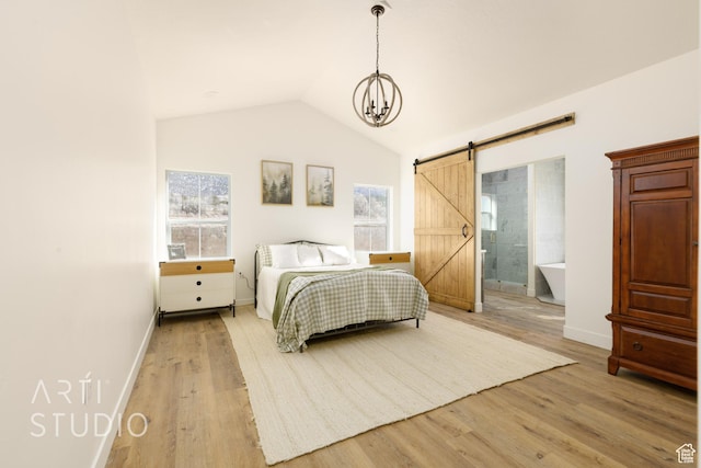 1283 S 500 W Unit 10, Manti, UT 84642 - bedroom featuring baseboards, vaulted ceiling, a barn door, and wood finished floors